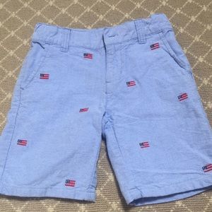 Light blue shorts w/ American flags on them.